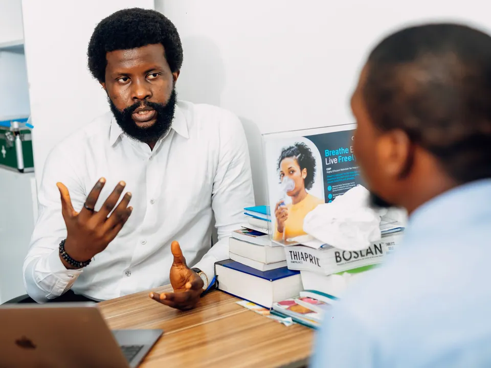 Doctor consulting with a patient in a medical office in Lagos, Nigeria
